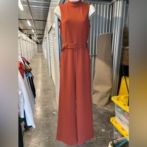 Express burnt orange high neck jumpsuit with belt size S